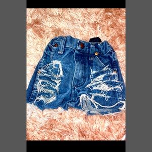Ripped Wrangler shorts